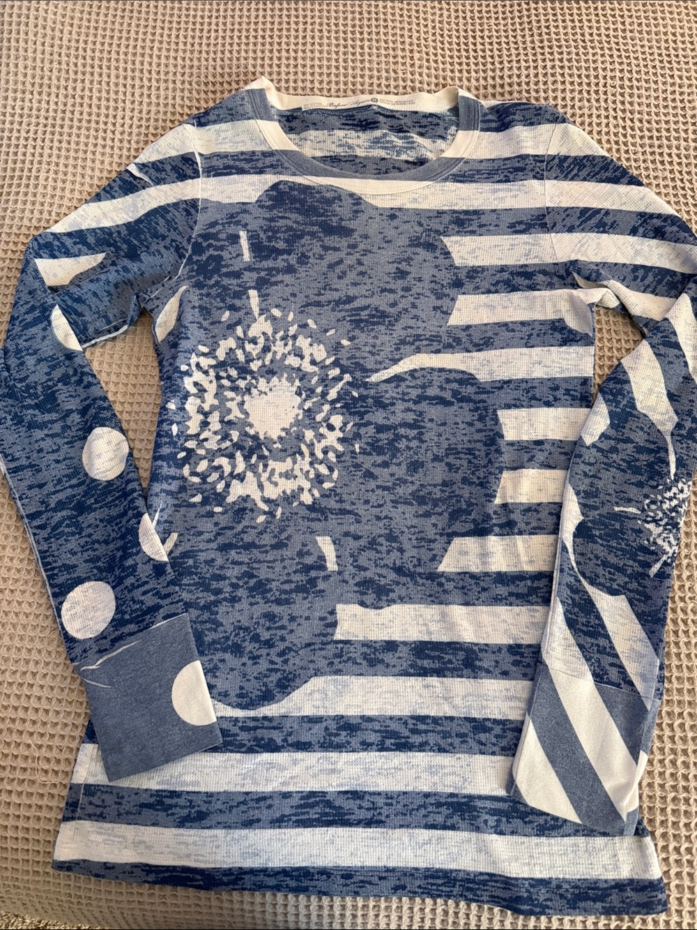 Striped Blue and White Long-Sleeve Tee with Floral Accent